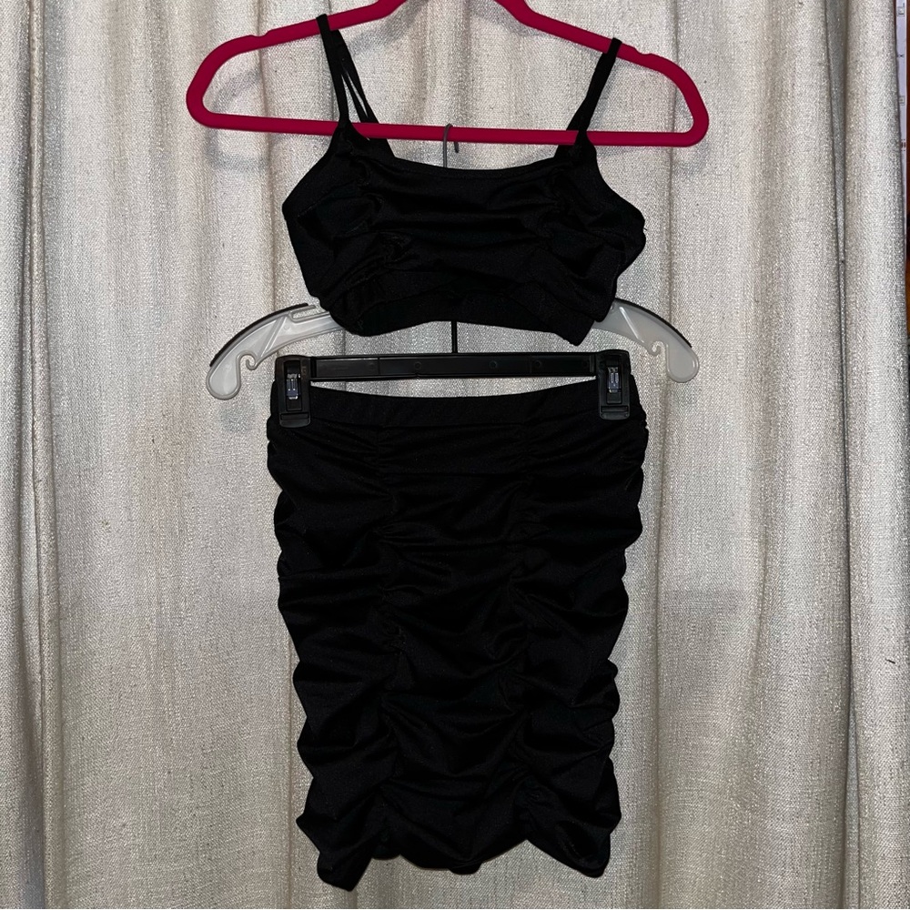 no comment | black top & skirt